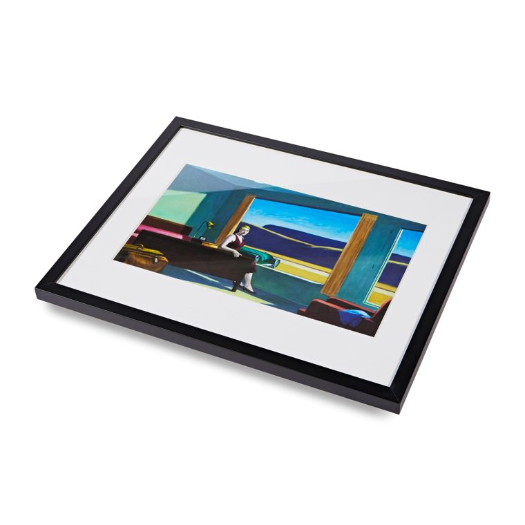 A framed print with a mount, lying flat